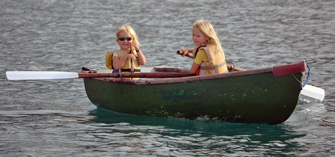 Sisters rowing.