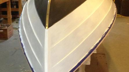 17' LOA Cape Split Peapod, bottom of boat upside down in shop