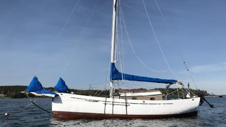 1990 Lyle Hess Cutter, in water on mooring starboard side view