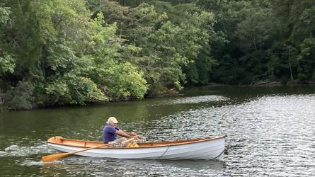 GORGEOUS 15' WHITEHALL STYLE ROWBOAT, in water starboard side view
