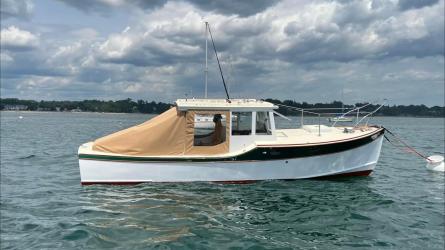 D Hylan Bowler design 26.5’  Pocket Downeast Cruiser, in water