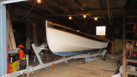 18' Handy Billy, on trailer in garage port side bow view
