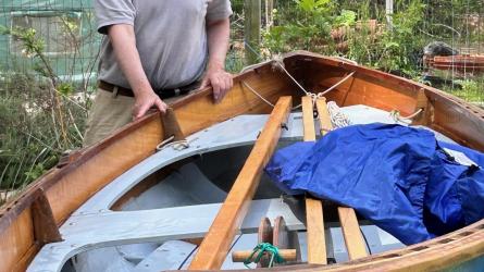 Chesapeake Light Craft Peapod, on trailer looking at boat