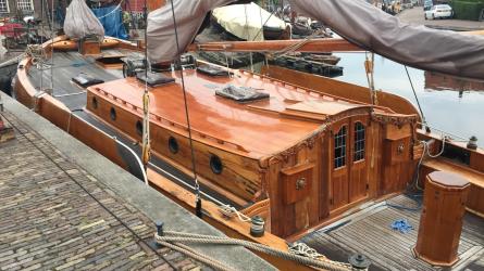 GROOTE BEER, classic flat bottomed Dutch Botteryacht, docked port side view of deck