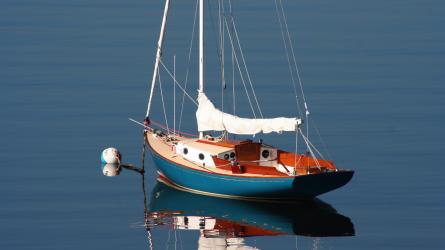BRIDGES POINT 24, Sail #37, moored in water port side stern view