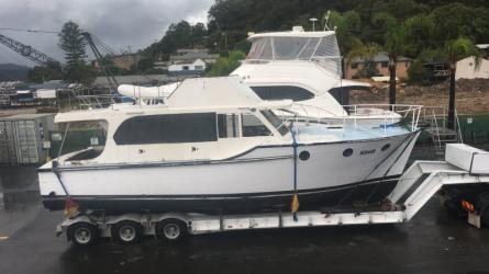 X, 38' Flybridge cruiser built by Wal Shirt.