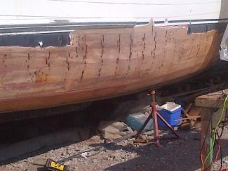 Bottom rebuild including ribs, keel, keelson, stem, apron and knee.  Many planks replaced.
