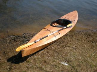 The Wood Duck 12 kayak on a Maryland beach