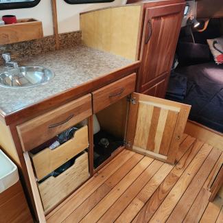 2013 PACIFIC COAST FISHING DORY $17,500, cabinet sink area