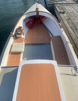 1923 Cape Cod Power Dory , docked in water view from above looking toward bow