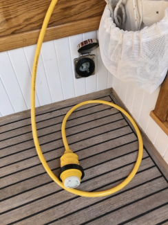 2018 Dark Harbor, yellow electrical cord and outlet on deck