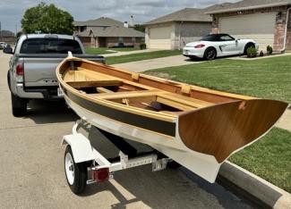 Arch Davis Penobscot 13’ Skiff, on trailer, stern port side view
