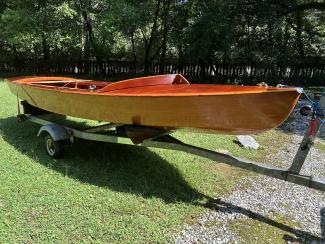 GERBER ALL-VARNISHED WOODEN SNIPE SAILBOAT, on trailer starboard side bow view