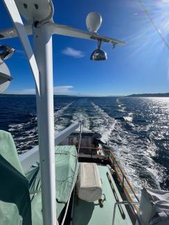 Well Maintained True Classic Grand Banks, underway looking out at stern and wake
