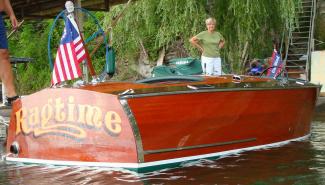 1934 GarWood 18' Split-Cockpit Runabout, docked port side view from stern