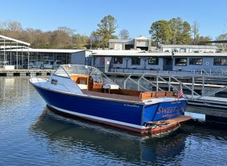 1968/2018 CHRIS-CRAFT CAVALIER CUTLASS 27, docked in water port side view