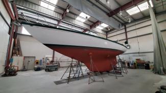 On the hard, showing her keel design (Seattle, WA).