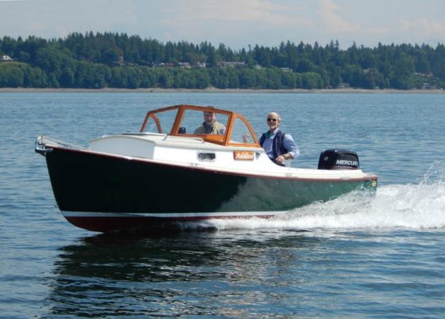 ADELINE at 20+ knots with designer/builder Sam Devlin at the helm.