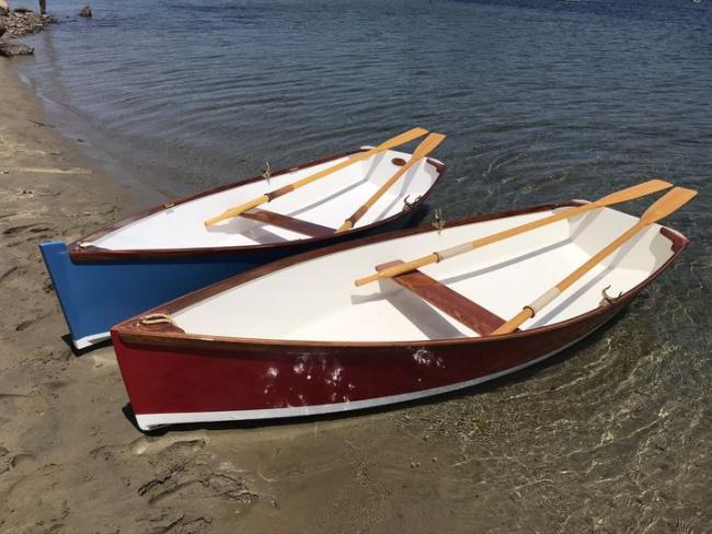The two boats at rest on the sand spit at Morro Bay California