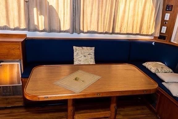 Grand Banks luxury motor yacht, inside table area