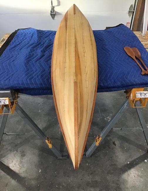 1/4 wooden plank canoe, underneath view bottom side