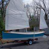 16' Catbird, on trailer port side view sails up