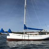 1990 Lyle Hess Cutter, in water on mooring starboard side view