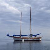 52 foot staysail schooner MOONDRIFT, in water moored port side view