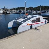 Solar Electric Trailerable Catamaran, docked port side view