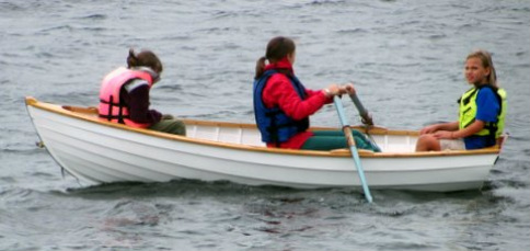 Rose Watts taking her two cousins for a row Simon Watts sea urchin wooden dinghy plans