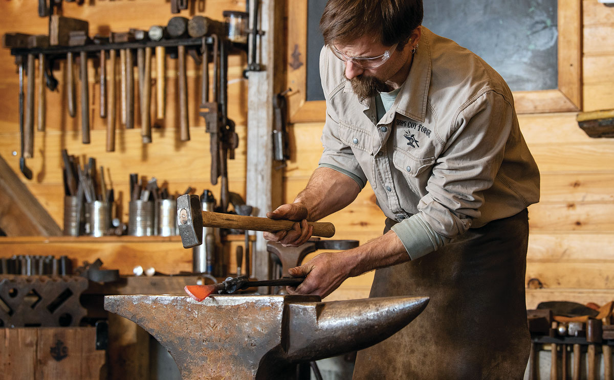 Med Chandler develops the shape of a caulking iron