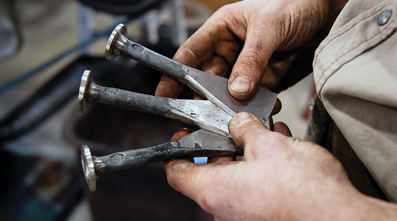 Transforming the rough iron into a polished final product.