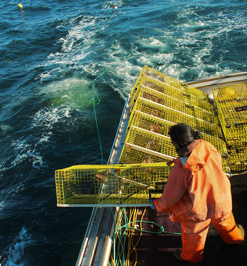 Keali’i works his way down the starboard rail.