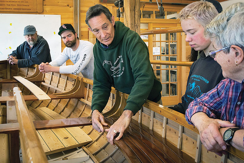 Lucas cuts a frame.