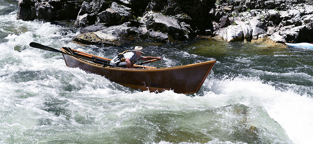 Greg Hatten running rapids