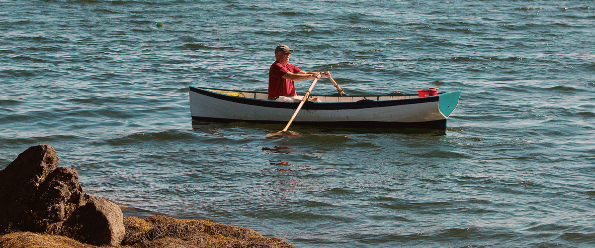 Author rowing a Saturday Cove Skiff