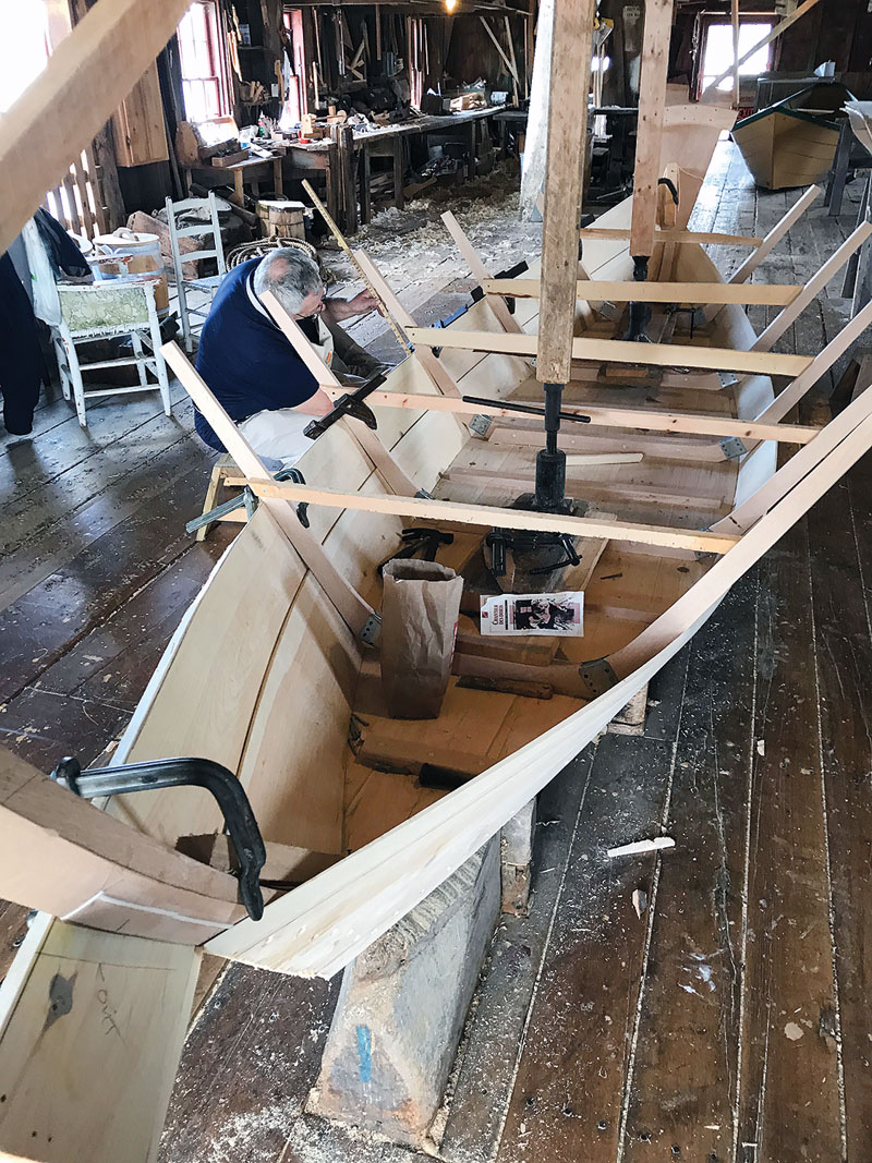 Buchanan and Boatshop helper Mick Fearn.