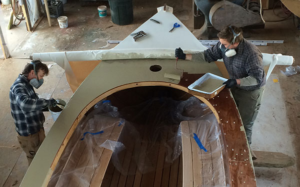 Spreading polyurethane.