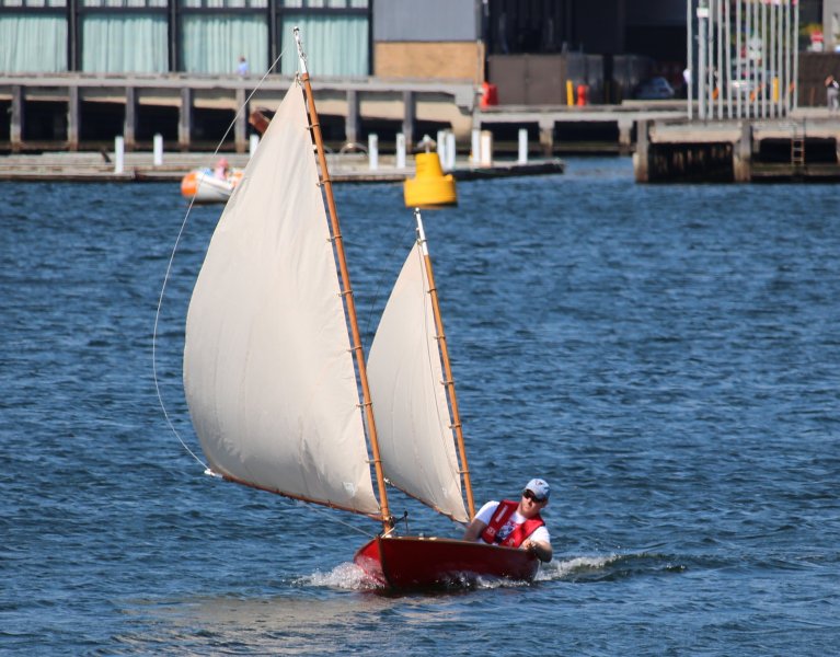 Photo of strip built sailing canoe