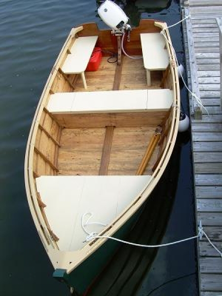 Wooden Boat with Seven People