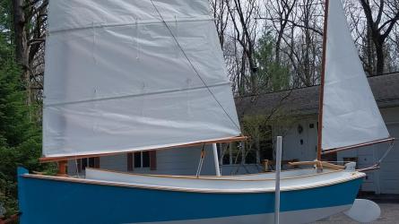 16' Catbird, on trailer port side view sails up