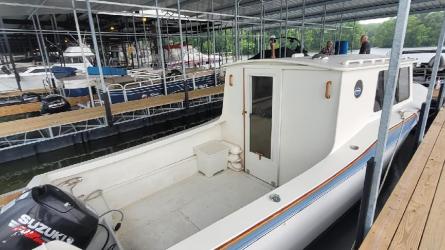 2008 27' custom cruiser, docked starboard side view