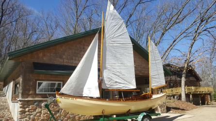 19' 7" Ketch Rigged Sailboat, view of port side, on the hard, sails up