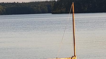 1979 Beetle Cat #1844, in water stern startboard side view