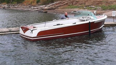 24' 1956 Century Coronado, in water, docked