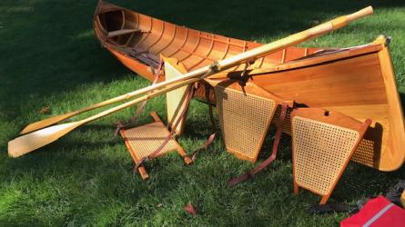 Adirondack boat- 3' beam, oars, seats view laying on the grass