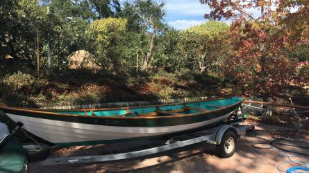 21-Foot Beachcomber Alpha Sailing Dory for sale,  on trailer port side view