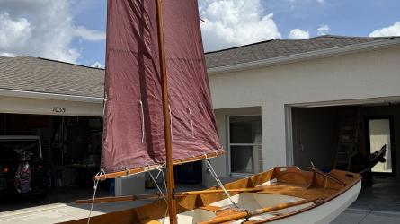CLC Passagemaker Dinghy, on tariler sail up portside view