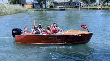 Classic 1956 Century Palomino Runabout 15', in water starboard side view