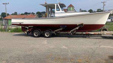 1961 Ralph Stanley Lobster Style Picnic Boat, on trailer starboard side view